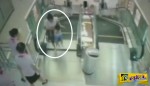 ΣΟΚ στην Κίνα: Έσωσε το γιο της λίγο πριν την «καταποιούν» οι κυλιόμενες σκάλες!