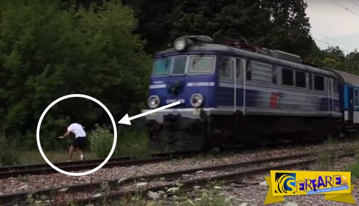 Άντρας πηδάει μπροστά απο διερχόμενο τρένο και γλυτώνει τελευταία στιγμή!